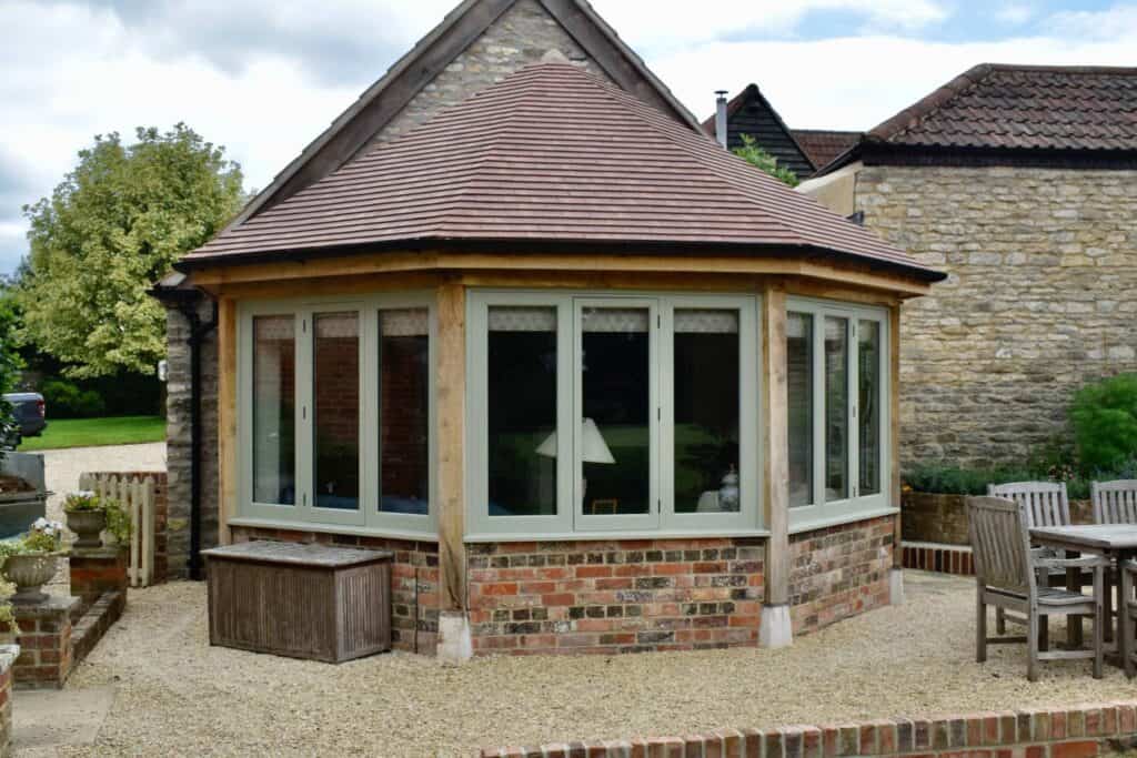 Oak Framed Conservatory by Timberpride - Outbuilding Planning Permission